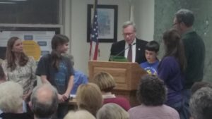 Mayor recognizes Autism Awareness Month, with Ian Titus by his side.