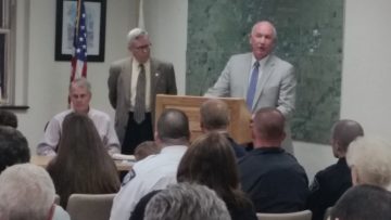 Mayor Dick Edwards presents award to Tim Dunn.