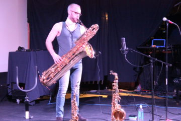 Nick Zoulek with bass saxophone