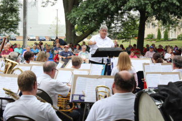 Thom Headley conducts the Bowling Green Area Community Band before the fireworks display Friday on the BGSU campus.