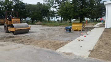 Handicapped accessible parking area is being added near the elevator.