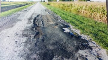 Broken up roadway in Portage Township