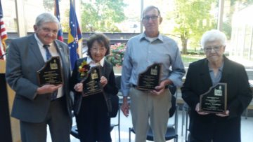 Awards were presented to Brian Tucker (from left), Jean Gamble, Dan Henry and Janet Stoudinger (received by her mother Jean Stoudinger).