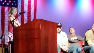 Jillian Roberts presents a reading about veterans.