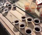 small cups sit on table with Hanks grape soda or aspen mulling cider