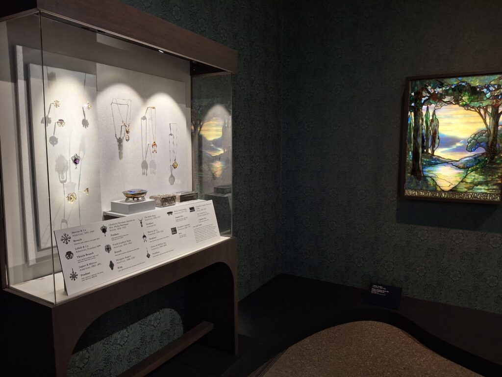 A Tiffany stained glass window and jewelry from Tiffany.