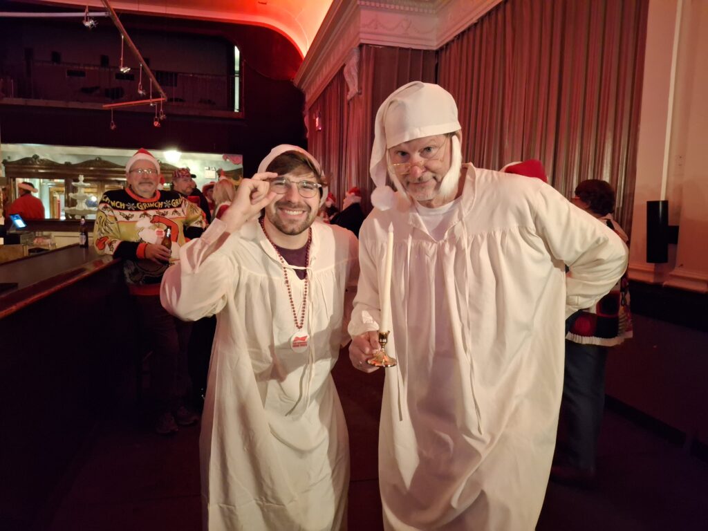 Sam Guizlo and Tom Gerrow both dressed as Scrooge.