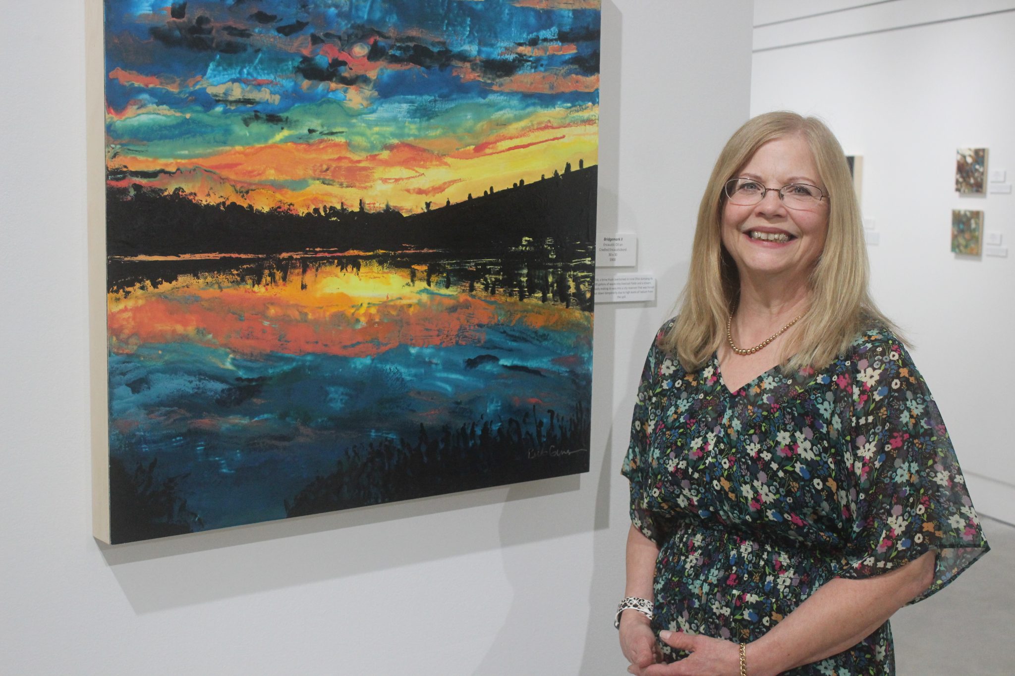 Genson uses painting to capture both the beauty of nature and fracking