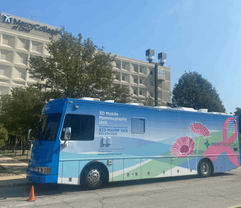 Mobile Mammography Van sits in front of Mercy Health Hospital Building