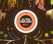 Image of a circle with "In The Round" surrounded by botanical images