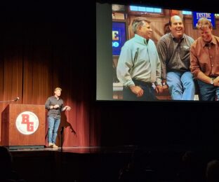 "This Old House" host Kevin O'Connor talks about his friendship on the show with a photo of two other people in the background.