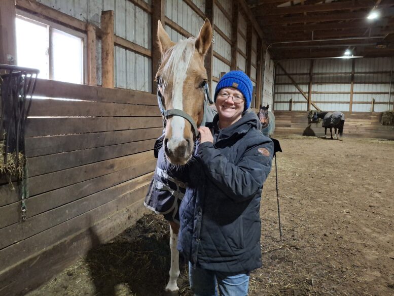 Stacey Creps with a horse.