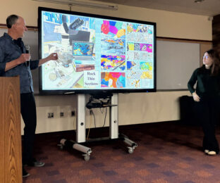 Dr. Kurt Panter and grad student Katie Shanks during Mar 25, 2026, Science Cafe