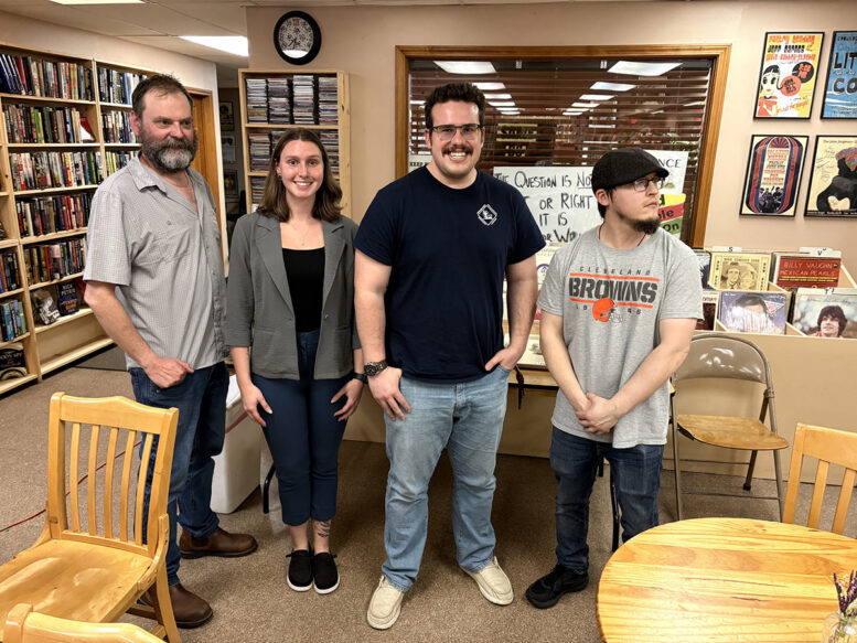 Science Cafe presenter Dr. James Metcalf and graduate students Ashlyn Malloy, Grant Hayden and Zachary Morris.