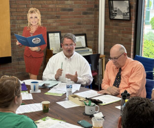 Michael Penrod, WCDPL director and Ken Frisch, board of trustees president at board meeting May 19, 2026