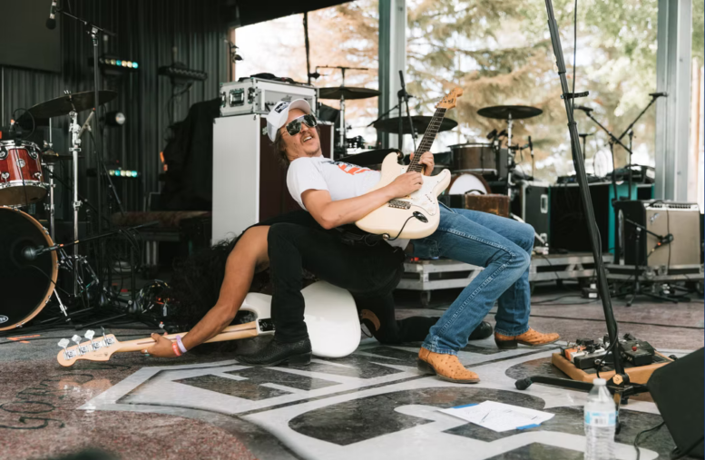 Silverada singer/guitarist Mike Harmeier and bassist Omar Oyoque performing